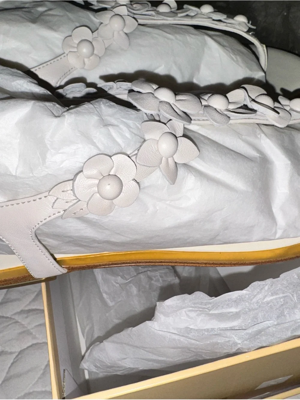 Michael Kors “Tricia” White Floral T-Strap Sandal with Gold Trim